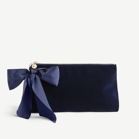 Ann Taylor Handbags - Ann Taylor/ Velvet Bow Clutch in Night Sky